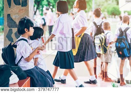 Kanchanaburi,thailand-july 2,2020:unidentified Elementary School Students Wear Face Mask To Prevent 