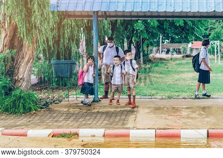 Kanchanaburi,thailand-july 2,2020:unidentified Elementary School Students Wear Face Mask To Prevent 