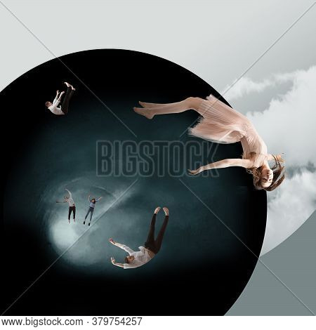 Mid-air Beauty Cought In Moment. Full Length Shot Of Attractive Young Woman And Man Hovering In Air 