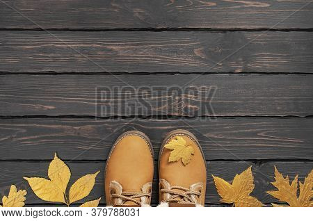 Autumn Fashion Concept. Brown Orange Leather Women Boots With Fur, Checkered Warm Plaid, Golden Autu
