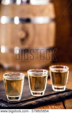Small Dose Glasses, High Quality Distilled Alcohol. Brazilian Cachaça (called Pinga), Dripping, With