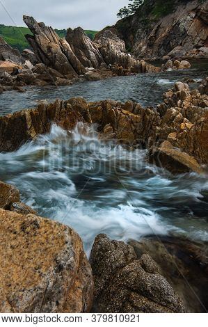 Rocky Seashore, Rough Stones On The Seashore, Coast Primorye Territory Telyakovsky Bay Of The Pacifi
