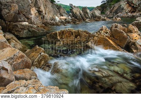 Rocky Seashore, Rough Stones On The Seashore, Coast Primorye Territory Telyakovsky Bay Of The Pacifi