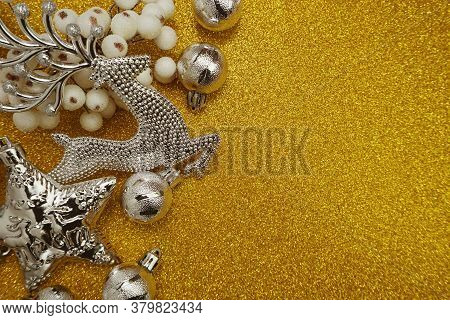 Silver Christmas Ornaments With Christmas Balls And Elk Dedcoration With Space Copy On Gold Glitter 