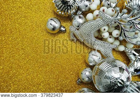 Silver Christmas Ornaments With Christmas Balls And Elk Dedcoration With Space Copy On Gold Glitter 