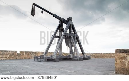 Ancient Catapult Located On The Ramparts Of Alghero