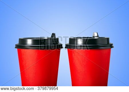 Paper Coffee Cups On Blue Background. Two Coffee Cup To Go.