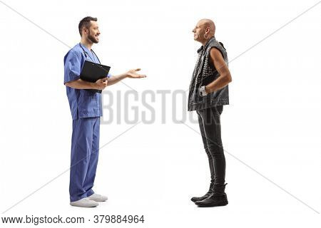 Full length profile shot of a medical worker talking to a bald punk rocker isolated on white background