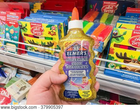 Moscow, Russia, December 2019: Close-up Of A Bottle With Golden Shiny Glue From Palmer\'s For Making