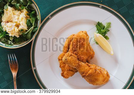 Viennese Fried Breaded Chicken Wth Potatoe Mayonnaise Salad - A Tasty Classic Specialty O Austrian C