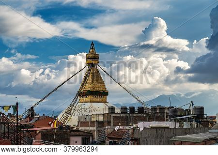 The View From Nearest Rooftops Of Kathmandu To The Boudha Stupa Against The Backdrop Of A Dramatic S