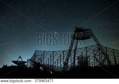 Two Antennas Of The Station Of Exploration Of An Ionosphere. A Silhouette Against The Background Of 