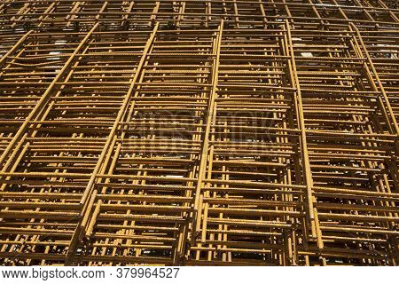 A Heap Of Wiremesh Steel Covering By Rust On The Cocrete Floor In Front The Building In Construction