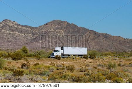 New Mexico Nm Usa - March 14, 2020: American Make Big Rig Semi Truck Transporting Reefer Fast On Mou