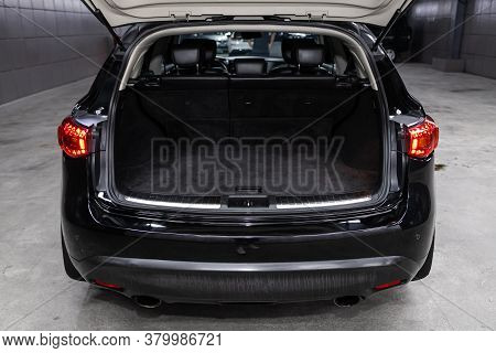 Novosibirsk/ Russia - August 01  2020: Infiniti Fx, Close-up Of The Open Trunk, Headlight, Bumper,  