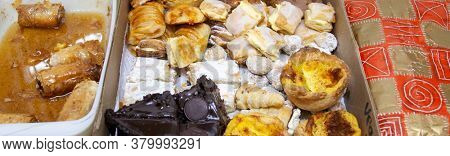 tray with various sweets and a gift
