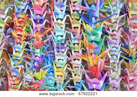 Paper Cranes Held Together By Fishing Lines