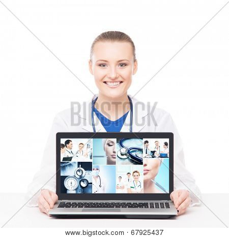 Doctor shows the collection of face lifting, plastic surgery and cosmetology photos on a computer. 