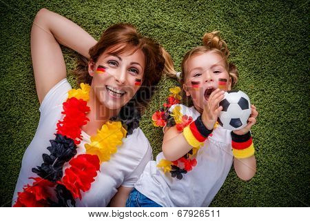 mother child soccer fan