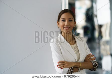 Portrait Of Young Happy Hispanic Business Woman