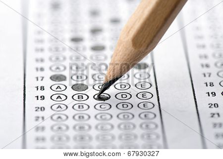 Filling answers of multiple choice examination close up