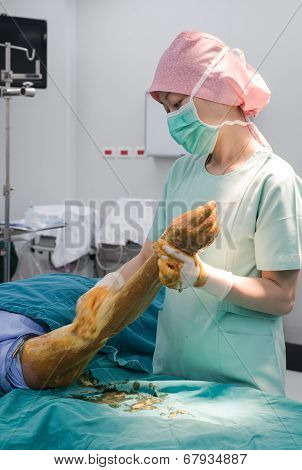 Scrub Nurse Use Cleaning Solution Paint All Forearm And Arm Prepare For Operation