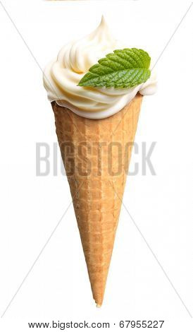 Soft ice cream cone with green mint leaf isolated on white background