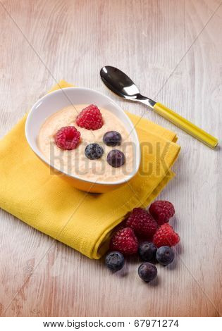 orange sorbetto with blueberry and raspberry