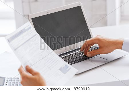 business, office, school and education concept - smiling businessman working in office