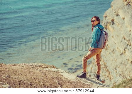 Traveler Girl Walking On Coast In Summer