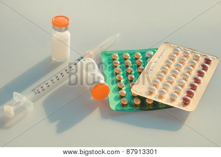 Birth control pill Injection Medication and Injection deviceswith shadow sunrise