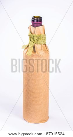 isolation one bottle wrapped in paper