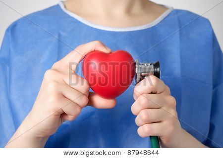 Doctor Examining A Heart
