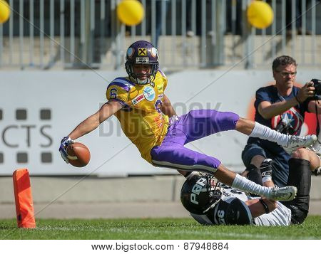VIENNA, AUSTRIA - APRIL 27, 2014: WR Laurinho Walch (#6 Vikings) scores a touchdown.