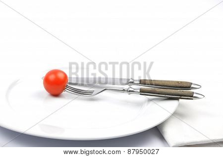 Tomato On Plate