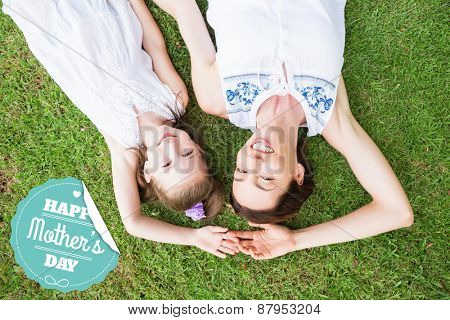 mothers day greeting against mother and daughter smiling at camera