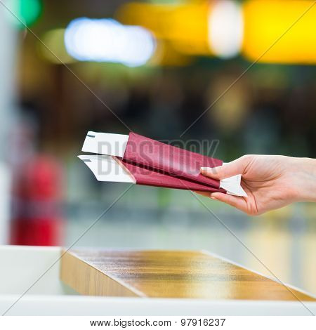 Closeup passports and boarding pass at airport indoor