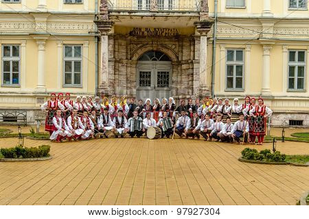 Members of folk group Tashe Miloshevski posing in yard of a well known building Saray in Macedonia.Resen Macedonia on november 25 2013