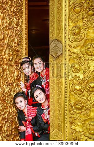 NAKORN PHANOM THAILAND - FEBRUARY 14 2015: Tourist ladies visit and join Thai northeastern Phutai world event day in Renunakorn of Nakorn Phanom Thailand