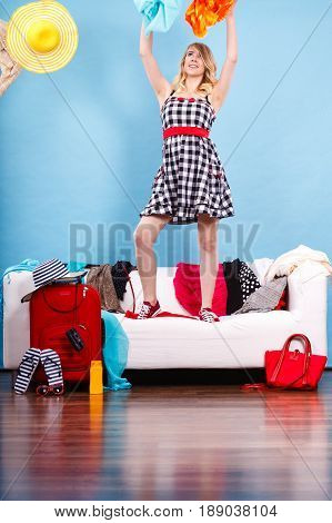 Woman Throwing Up Clothes, Clothing Flying Everywhere