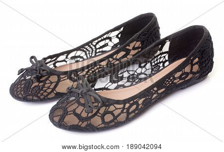 flat shoes in front of white background