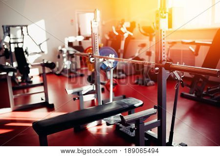 Close up view of barbell on floor in gym .hign contrast and monochrome color tone