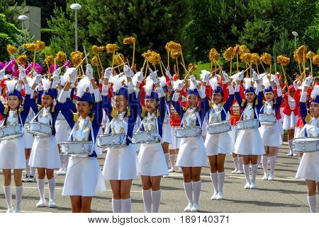 ALMATY KAZAKHSTAN - JUNE 1 2017: Solemn parade of children's and youth musical orchestras and ensembles on the Republic Square. More than 5000 schoolchildren took part in the parade.