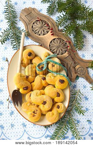 Sweet Swedish buns baked with saffron and chocolate.