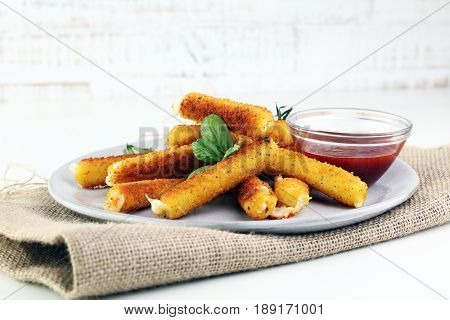 Breaded Mozzarella Cheese Sticks With Tomato Ketchup And Bbq Sauce