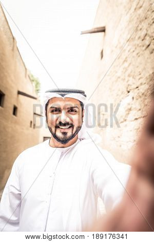 Arabic businessman in Dubai taking a selfie
