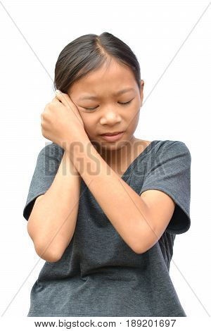 Sad little Asian girl have a earache on white background