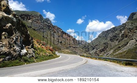The mountain road runs through the Kourtaliotiko gorge in Crete