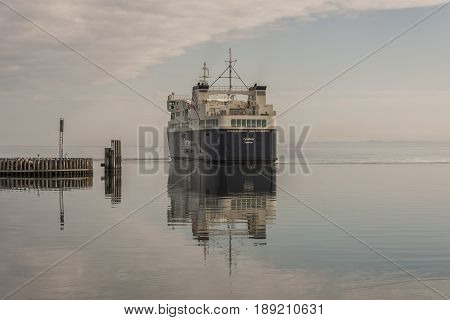 FYNSHAV DENMARK - MAY 7 2017: AlsFAERGEN ferry leaves port on may 7 2017 in Fynshav Denmark. The ferry connects Fynshav with Bojden in Denmark.