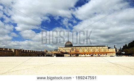 Al-Aqsa Mosque in Jerusalem on the top of the Temple Mount. Al Aqsa mosque is a sacred place for all muslims and islamic people.